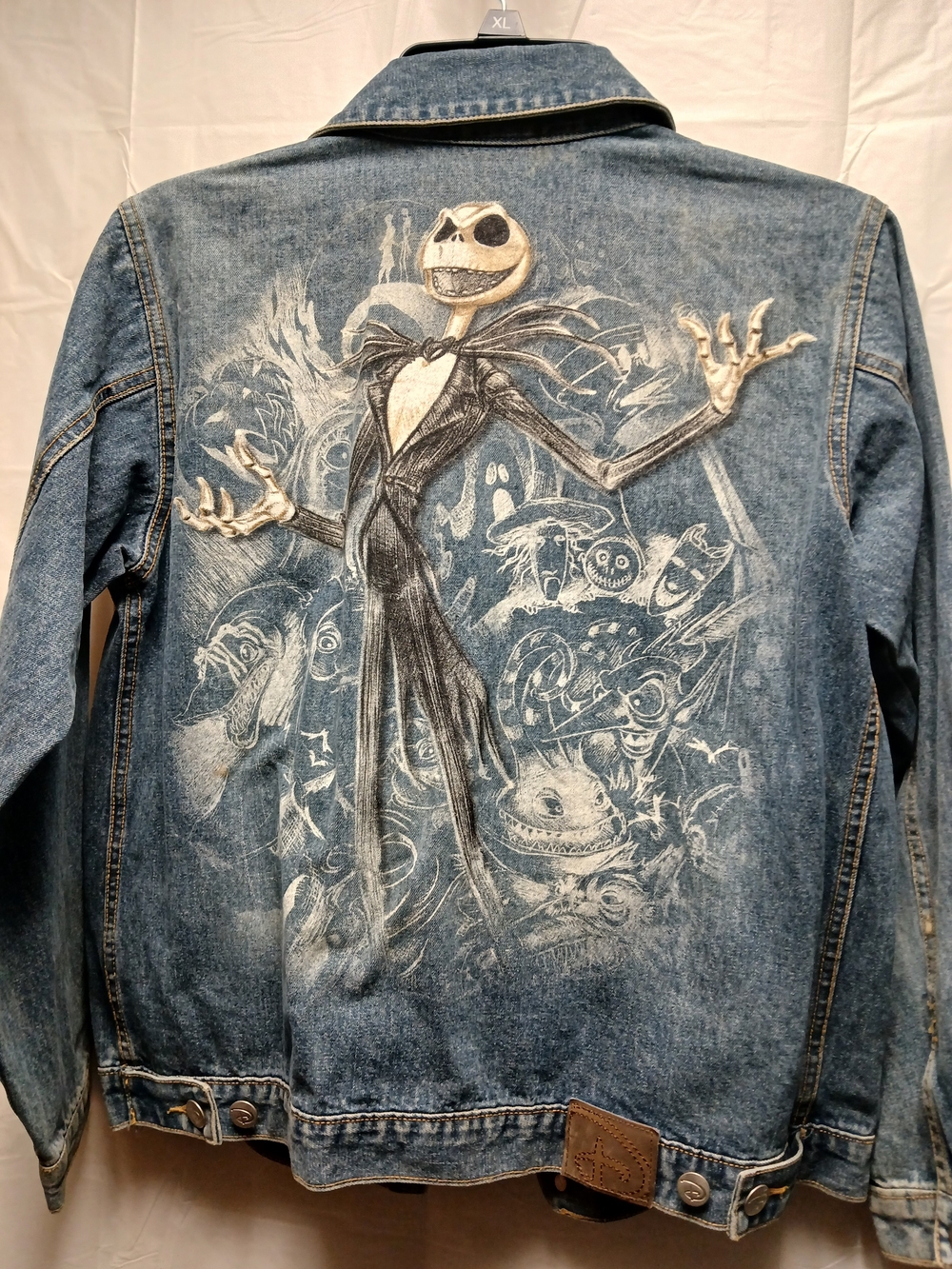 Disney STUDIO Collection Blue Denim Jacket with Jack Skellington Back Art